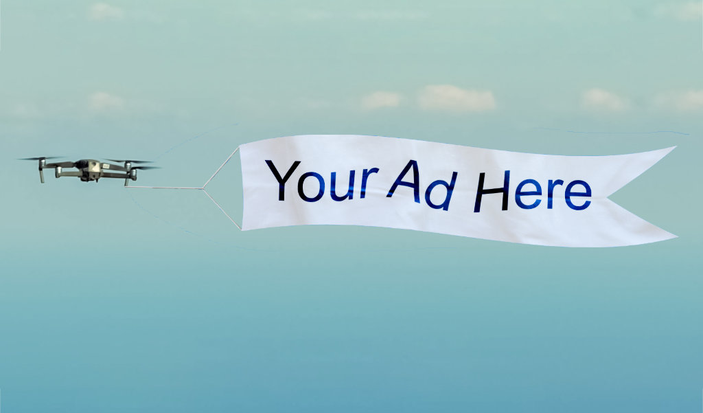 drone towing a banner - drone ads - aerial billboards - new to drones