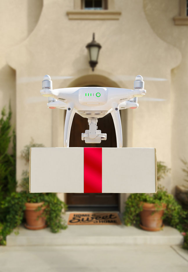 amazon air delivery drone - drone delivering red ribbon wrapped package - new to drones