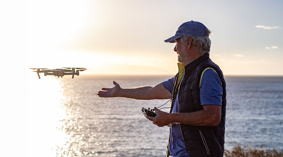 becoming a professional pilot - man learning to fly drone - newtodrones