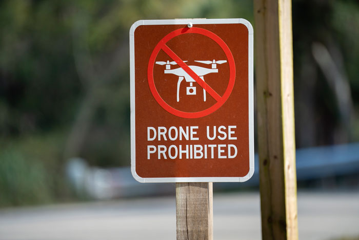 drone laws - drone use prohibited sign - newtodrones