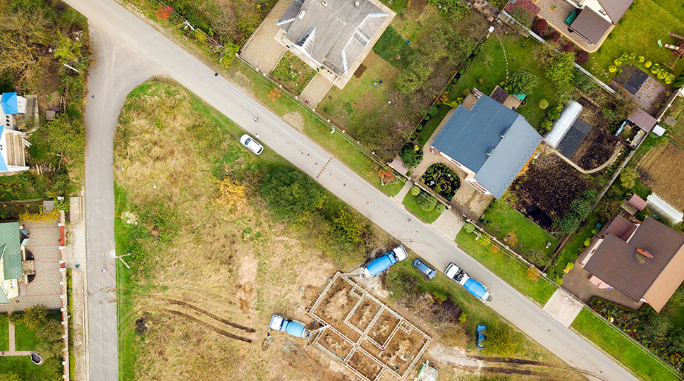 drone surveillance - aerial shot of rural residential area - new to drones